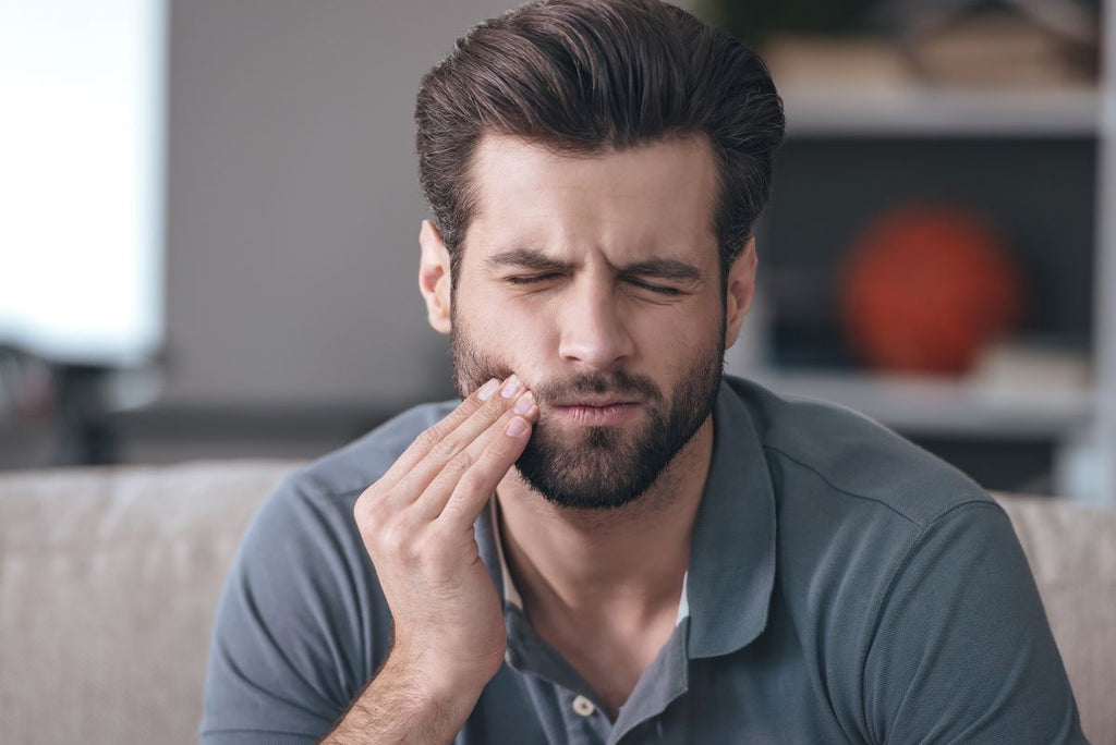 Man with jaw pain