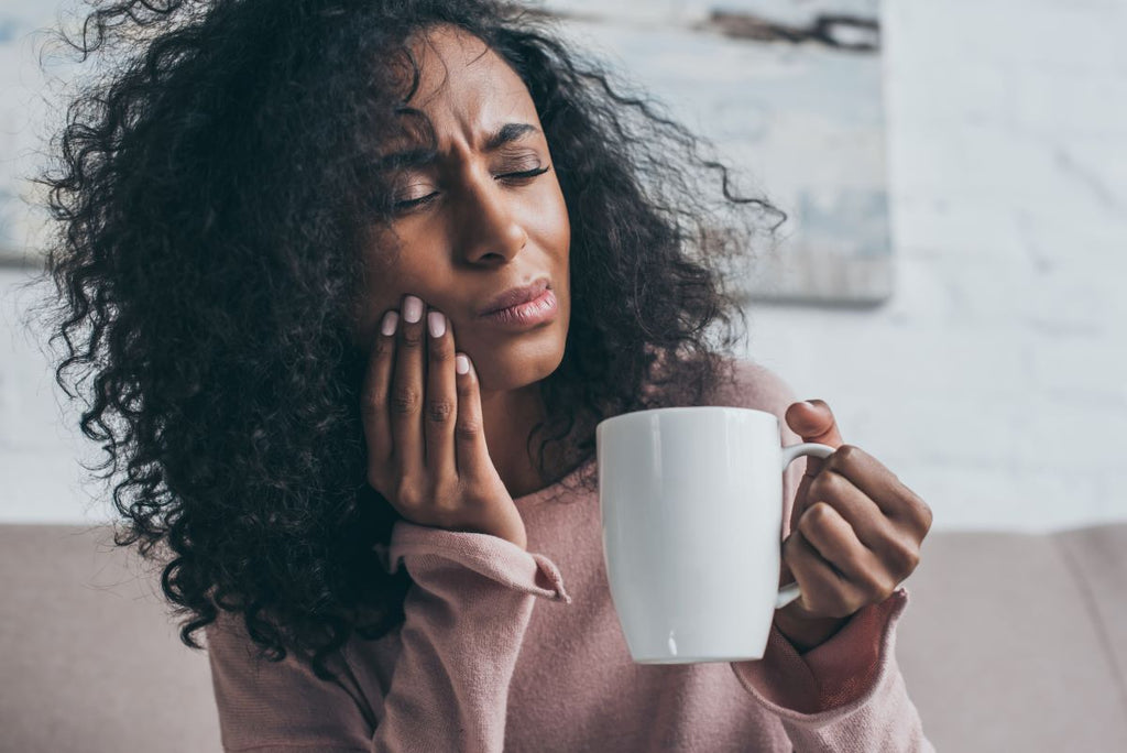 Woman with jaw pain